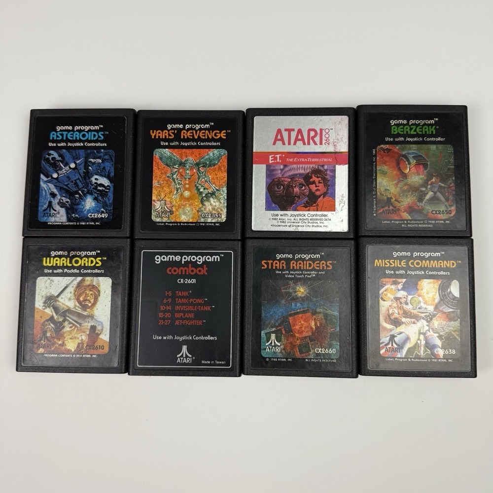Atari 2600 Lot of 8 Berzerk Asteroids Warlords ET Combat Missle Command +
